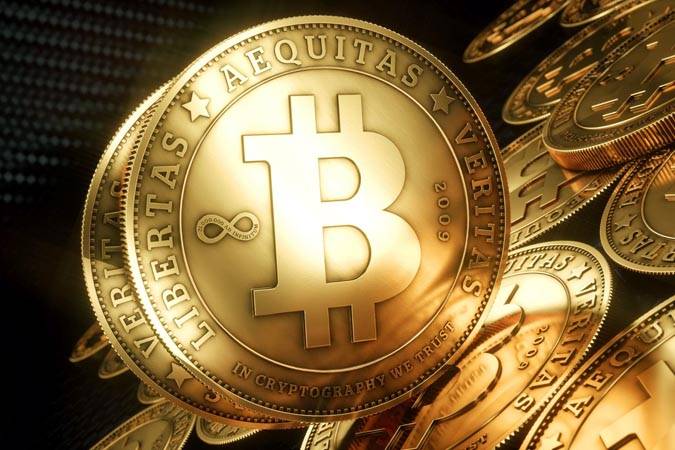 Биткоин впервые стал дороже унции золота